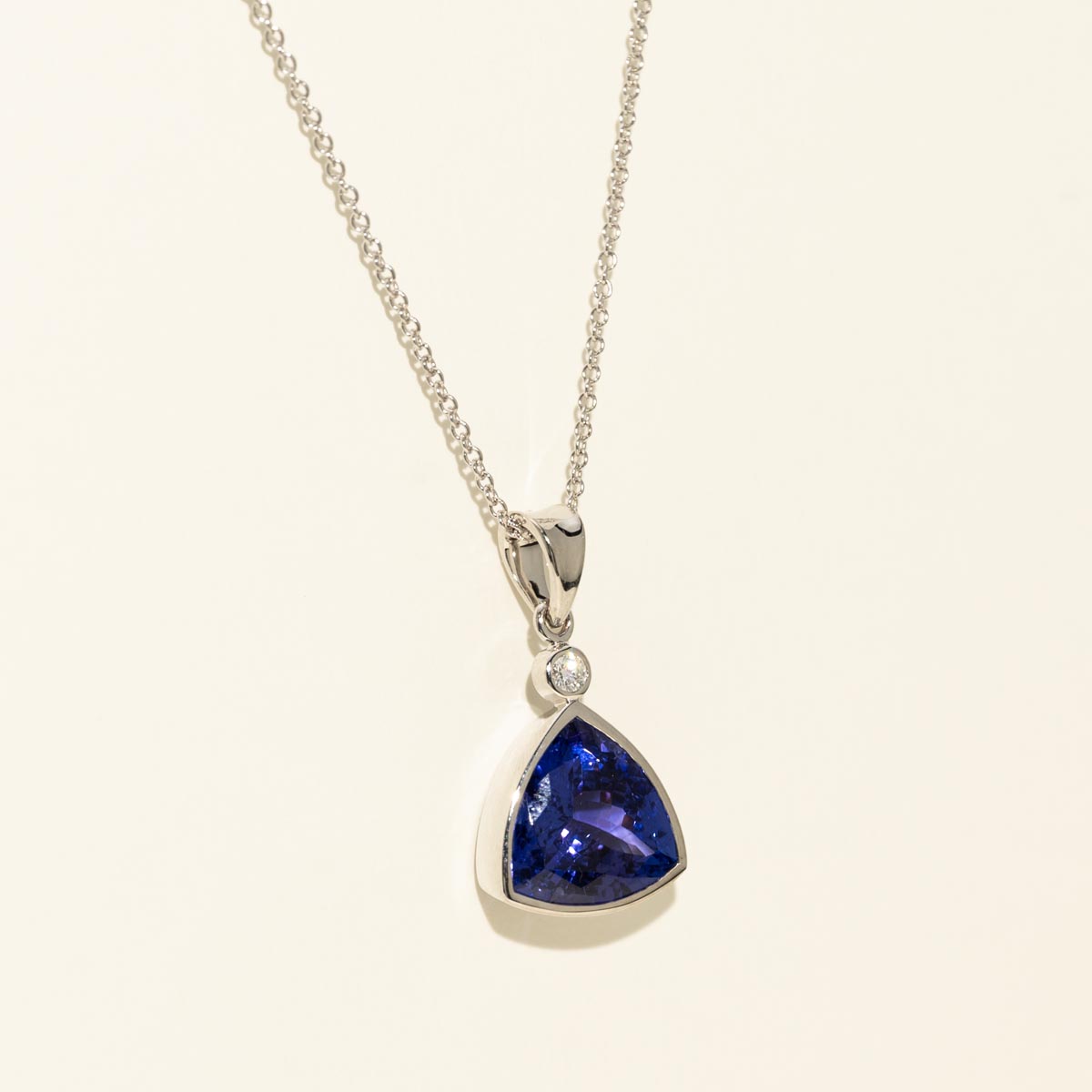 Trillion Cut Tanzanite Necklace in 18kt White Gold with Diamonds (.03ct tw)