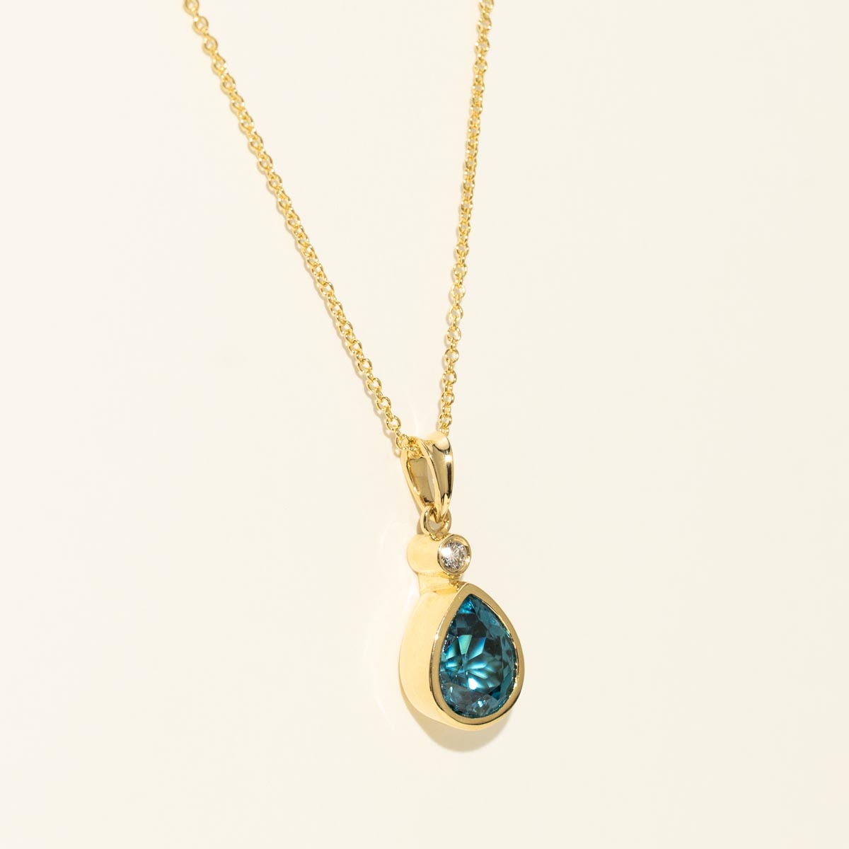 Pear Shape Blue Zircon Necklace in 18kt Yellow Gold with Diamond (.03ct)