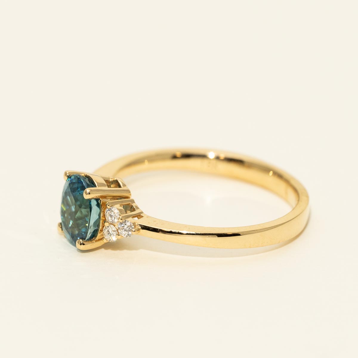Oval Blue Zircon Ring in 18kt Yellow Gold with Diamonds (1/10ct tw)