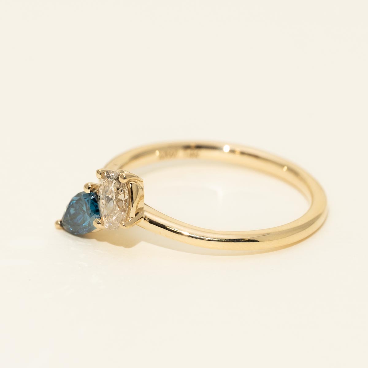 Pear Shape Blue and Oval White Diamond Toi et Moi Ring in 14kt Yellow Gold (5/8ct tw)