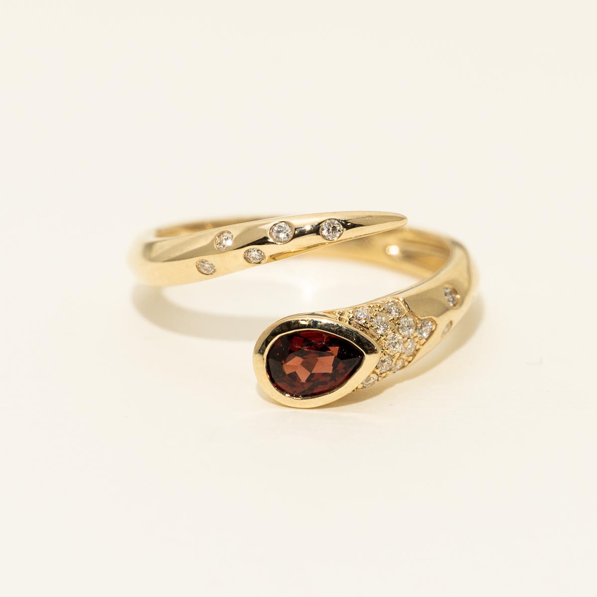 Madison L Pear Shape Garnet Bypass Ring in 14kt Yellow Gold with Diamonds