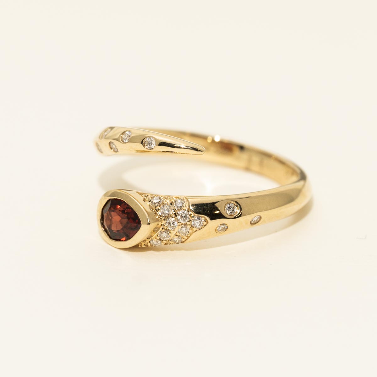 Madison L Pear Shape Garnet Bypass Ring in 14kt Yellow Gold with Diamonds
