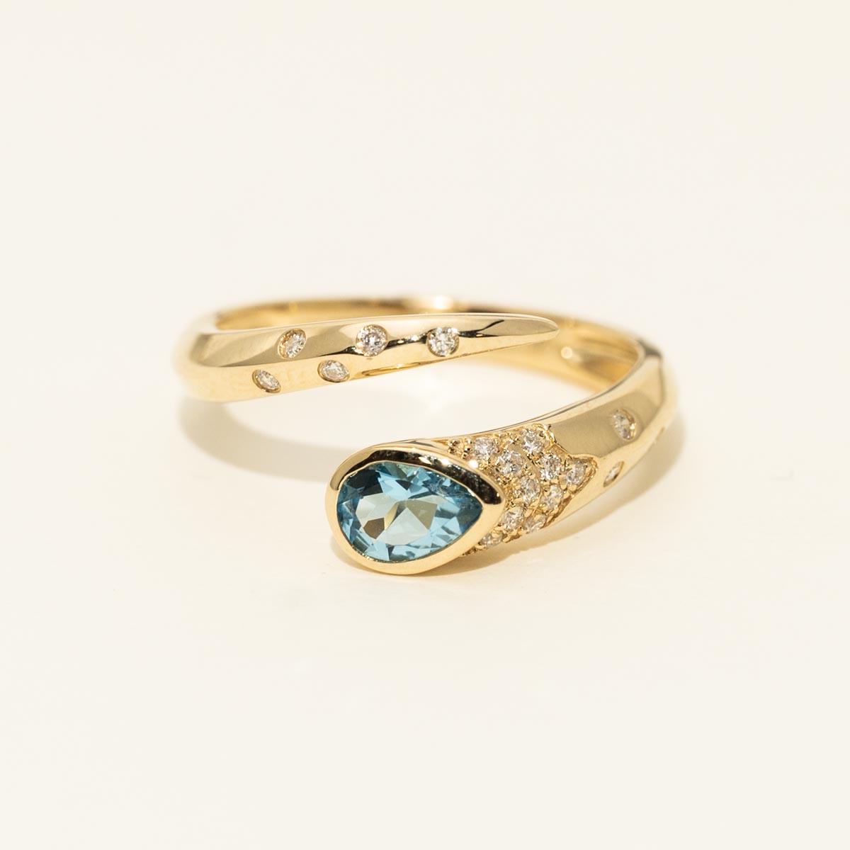 Madison L Pear Shape Swiss Blue Topaz Bypass Ring in 14kt Yellow Gold with Diamonds