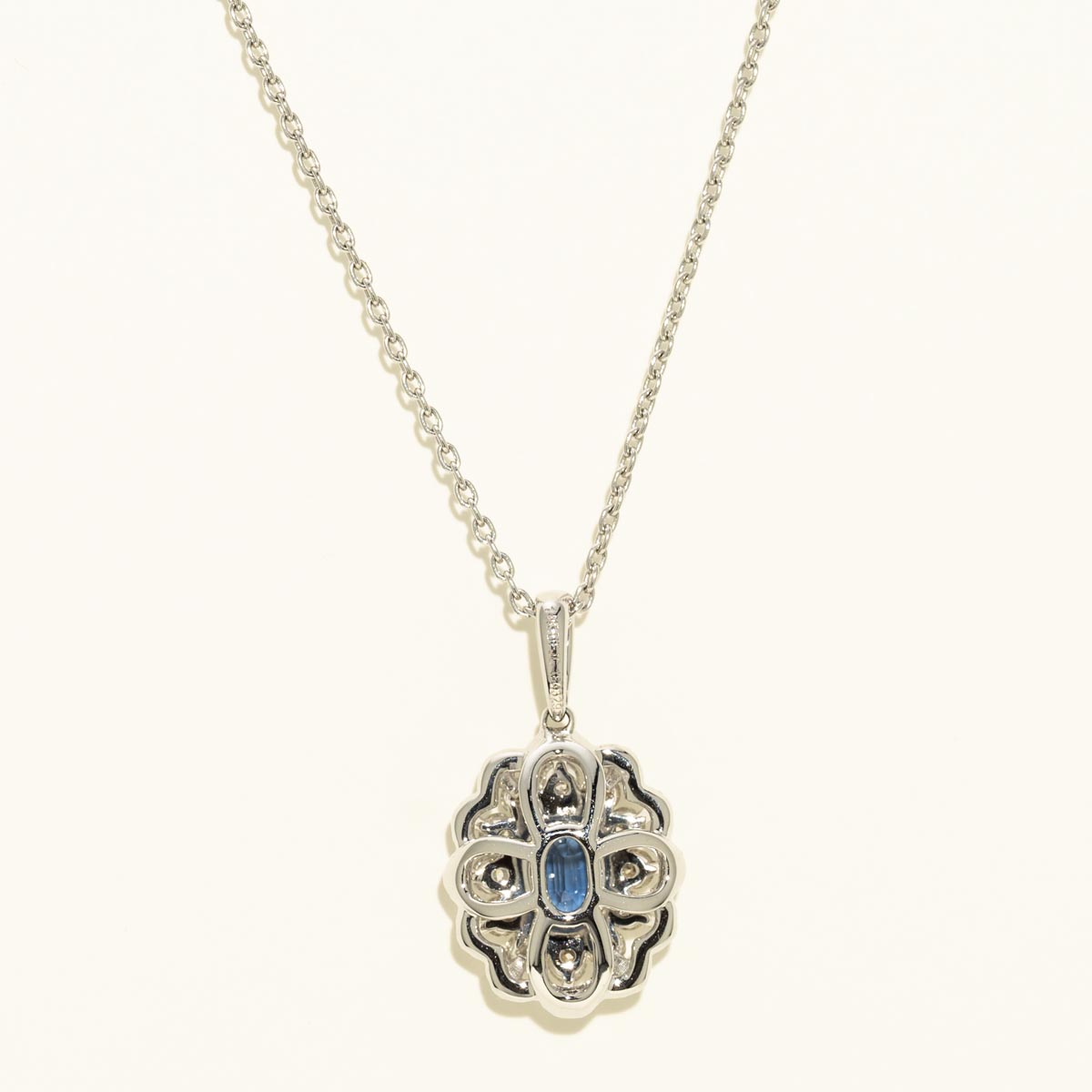 Oval Sapphire Halo Necklace in 14kt White Gold with Diamonds