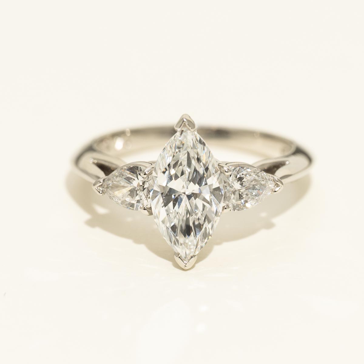 Marquise and Pear Shape Diamond Three Stone Engagement Ring in Platinum (2 1/4ct tw)