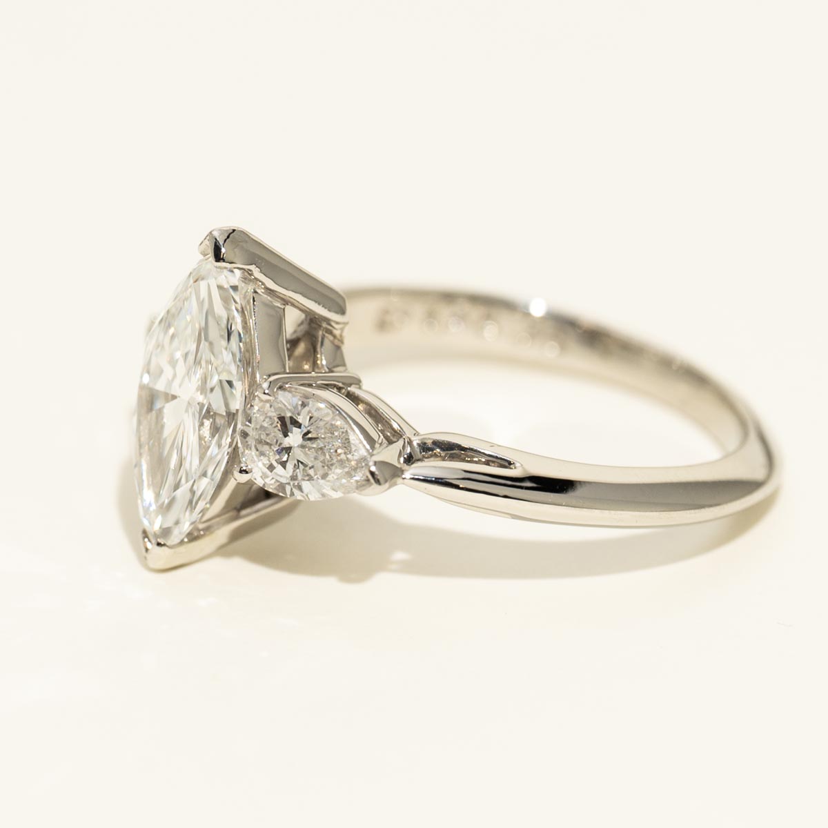 Marquise and Pear Shape Diamond Three Stone Engagement Ring in Platinum (2 1/4ct tw)