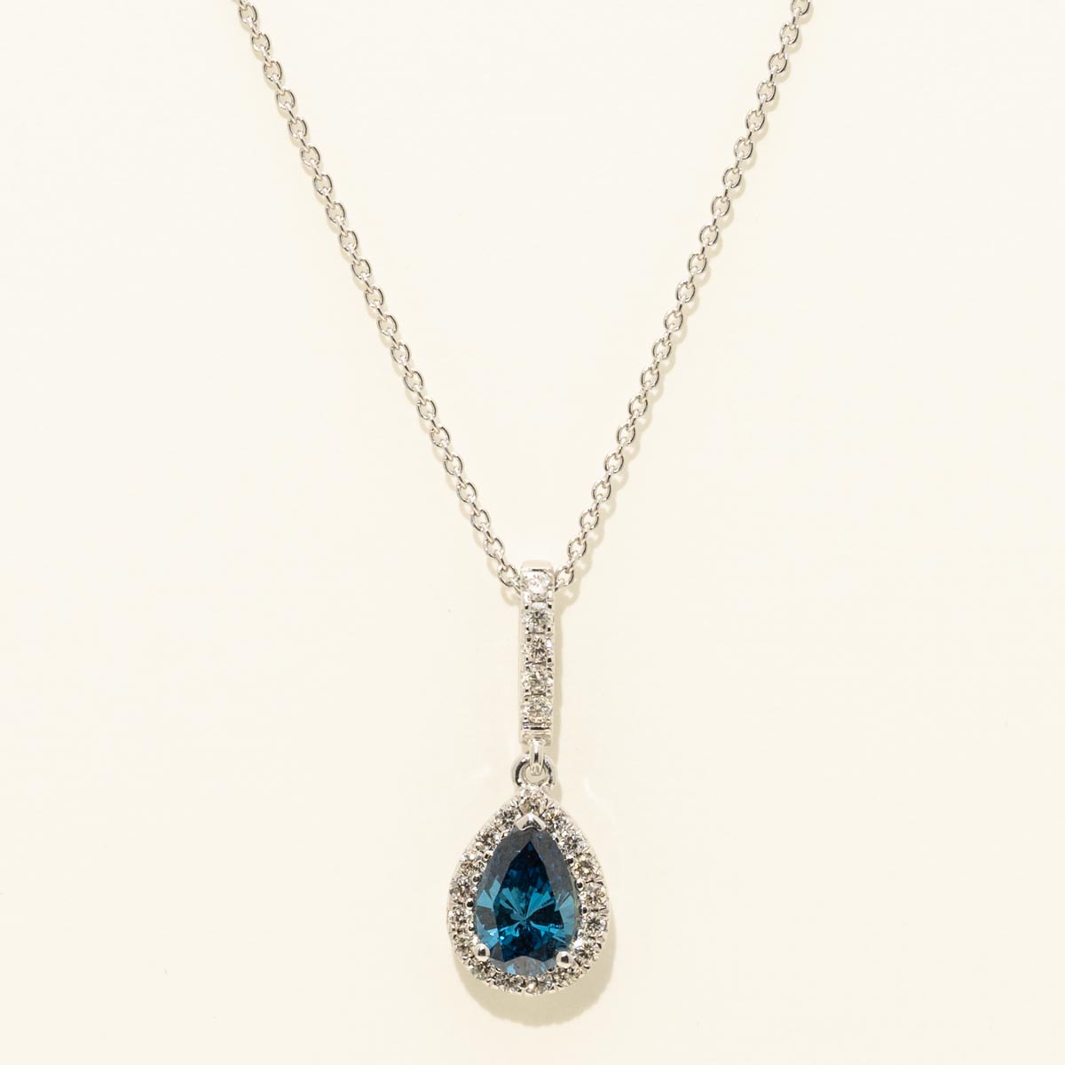Pear Shape Blue Diamond Halo Necklace in 14kt White Gold (1/2ct tw)