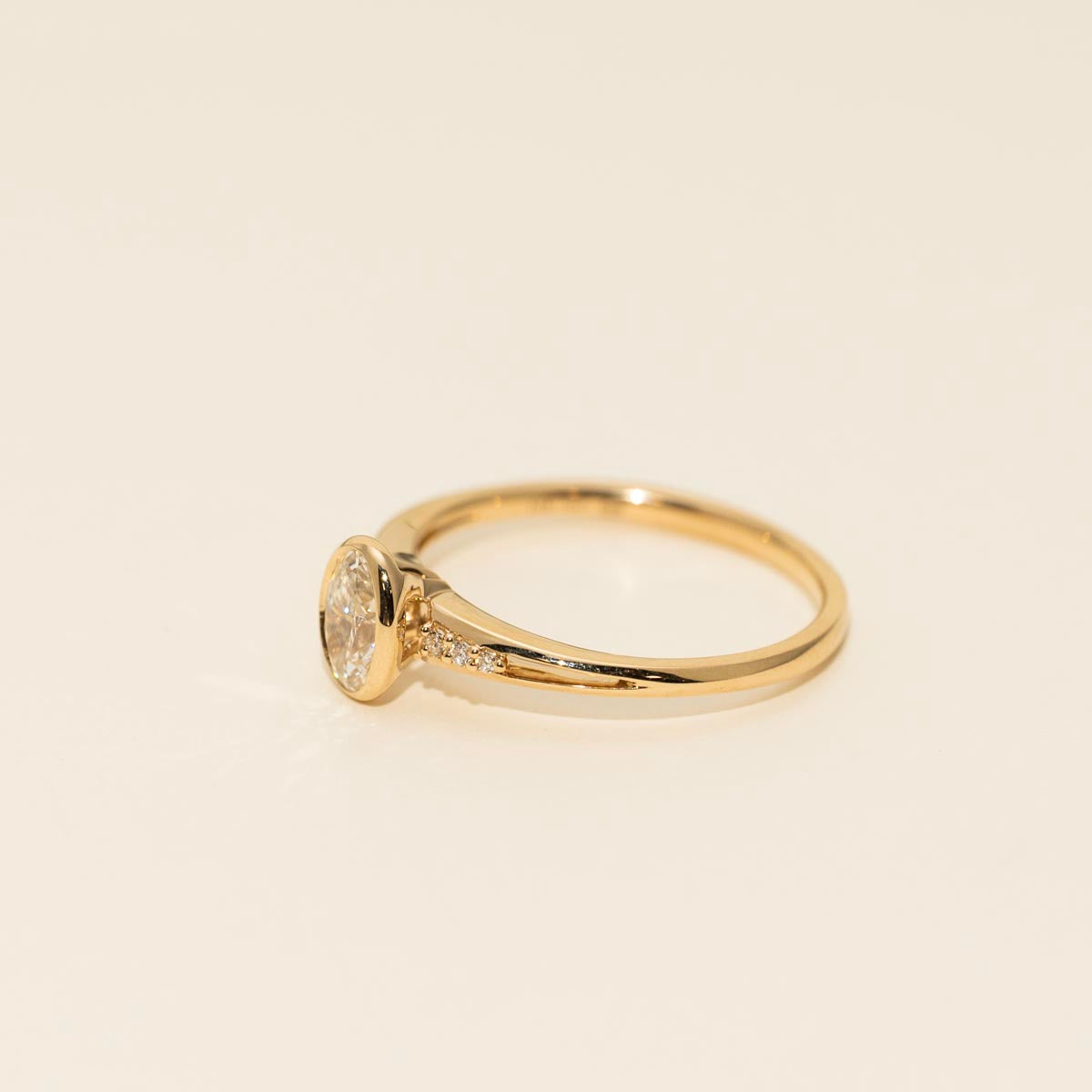 Oval Diamond Bezel Engagement Ring in 14kt Yellow Gold (1/2ct tw)