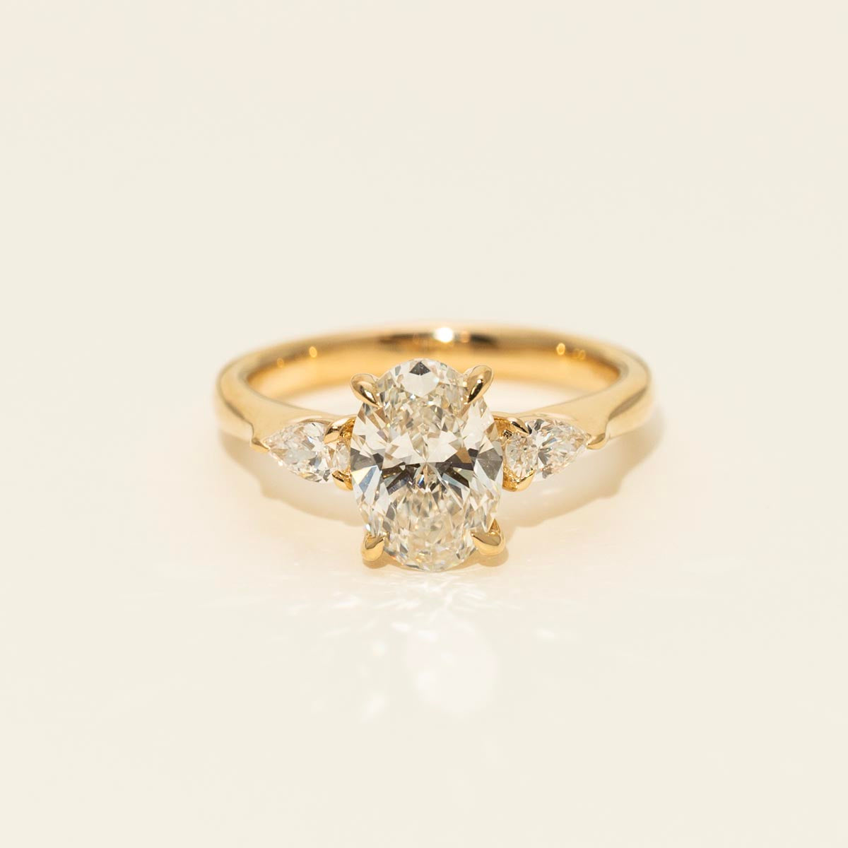 Lab Grown Oval and Pear Diamond Engagement Ring in 14kt Yellow Gold (2ct tw)
