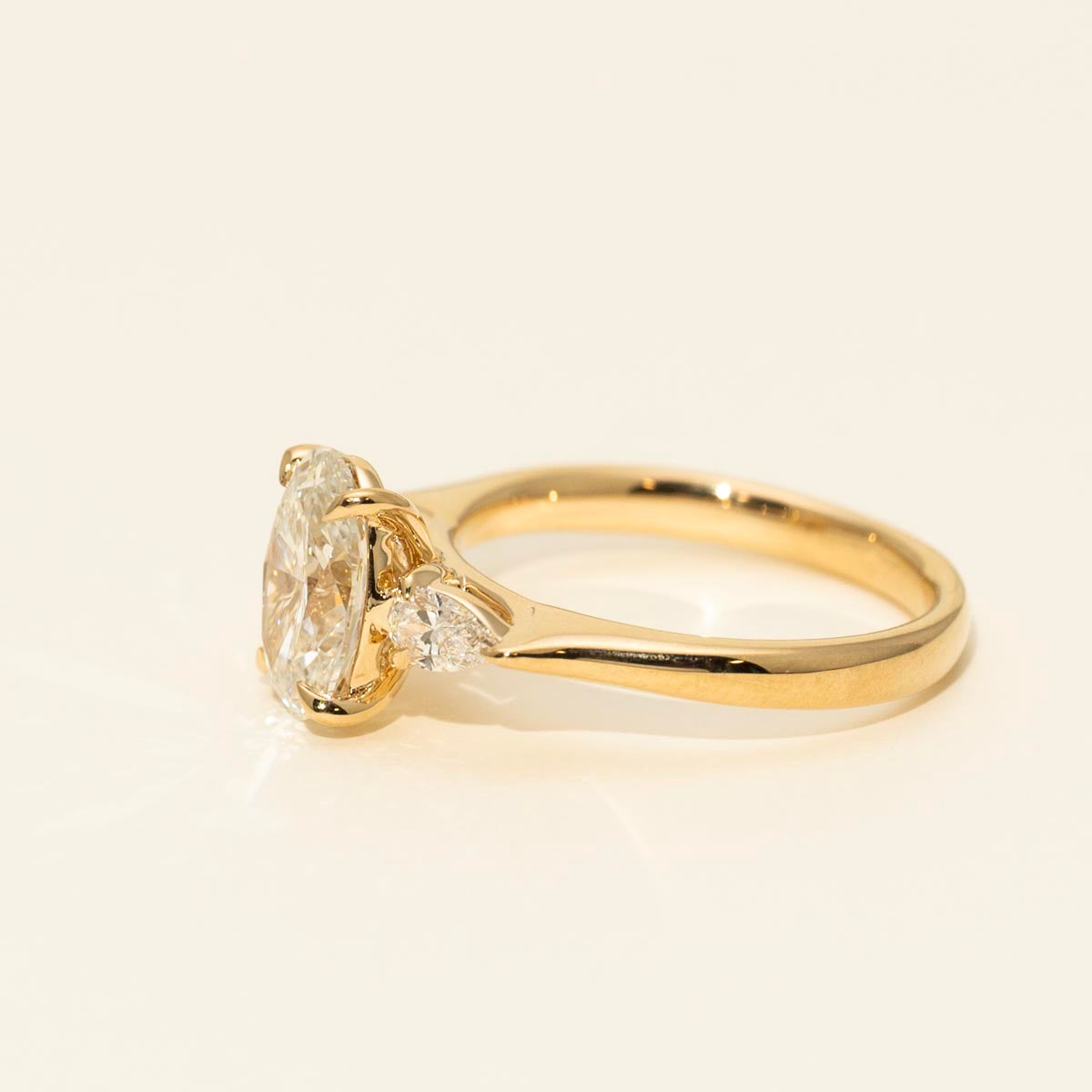 Lab Grown Oval and Pear Diamond Engagement Ring in 14kt Yellow Gold (2ct tw)