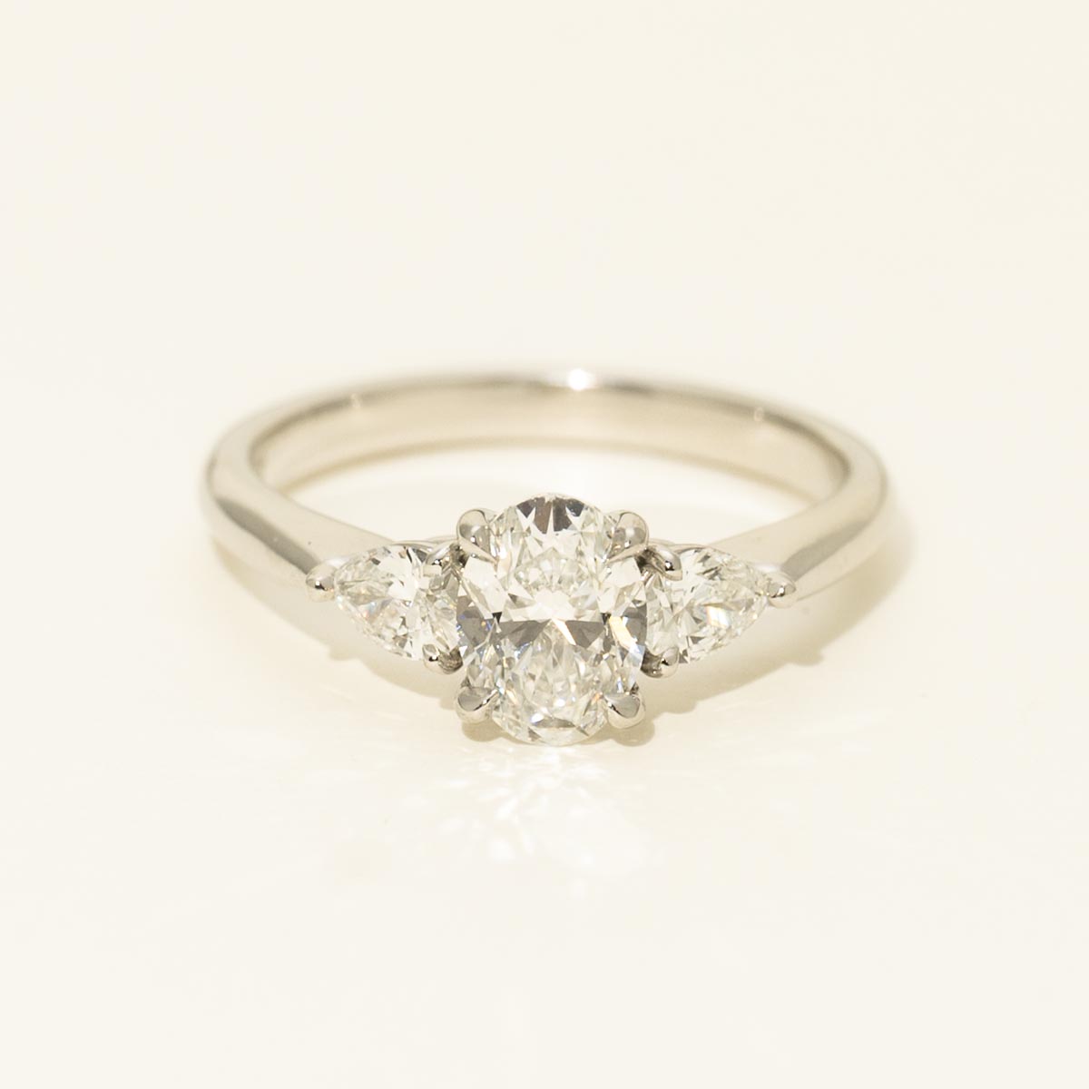 Oval and Pear Diamond Three Stone Engagement Ring in Platinum (1 3/8ct tw)