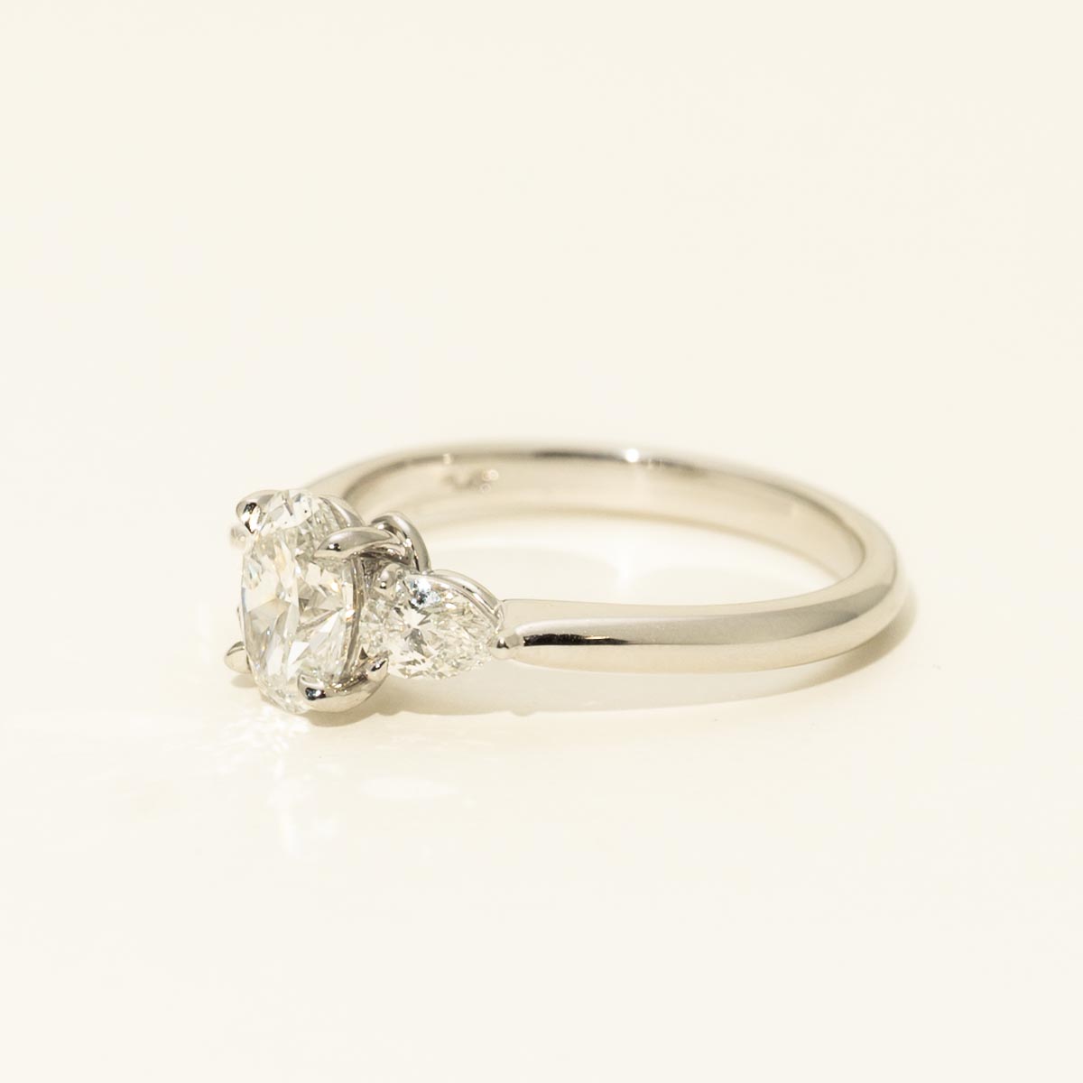 Oval and Pear Diamond Three Stone Engagement Ring in Platinum (1 3/8ct tw)