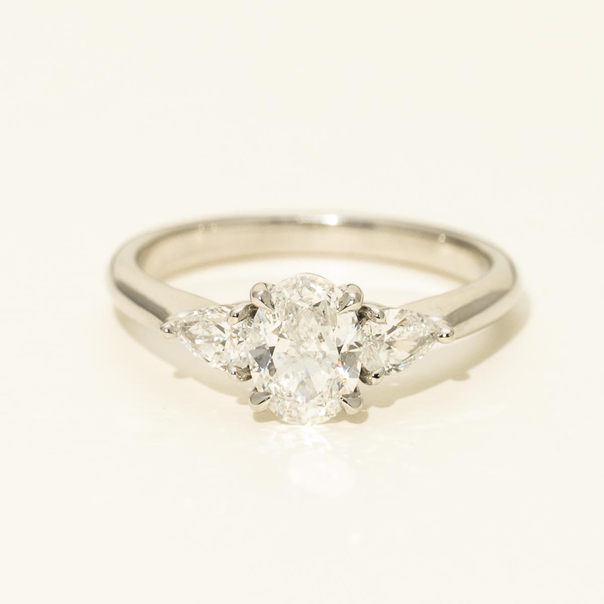 Oval and Pear Diamond Three Stone Ring in Platinum (1 3/8ct tw)