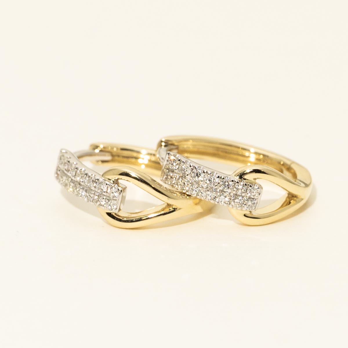 Diamond Hoop Earrings in 14kt Yellow and White Gold (1/7ct tw)