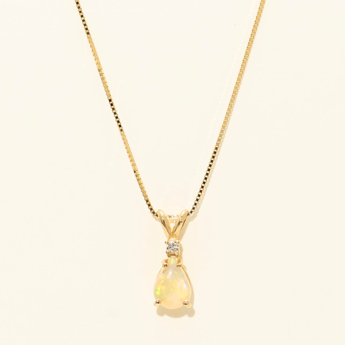 Pear Shape Ethiopian Opal Necklace in 14kt Yellow Gold with Diamond