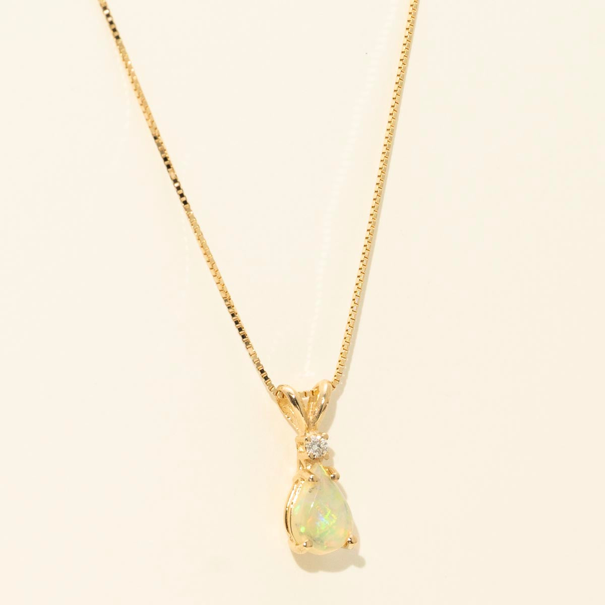 Pear Shape Ethiopian Opal Necklace in 14kt Yellow Gold with Diamond