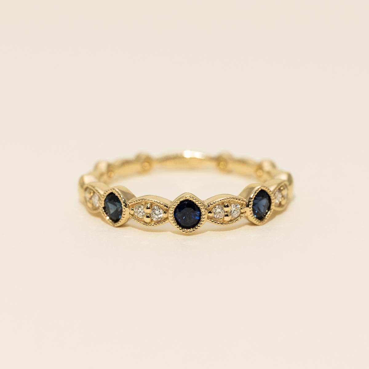 Diamond and Sapphire Wedding Band in 14kt Yellow Gold (1/10ct tw)
