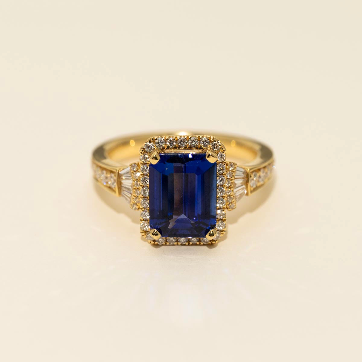 Emerald Cut Tanzanite Ring in 18kt Yellow Gold with Diamonds