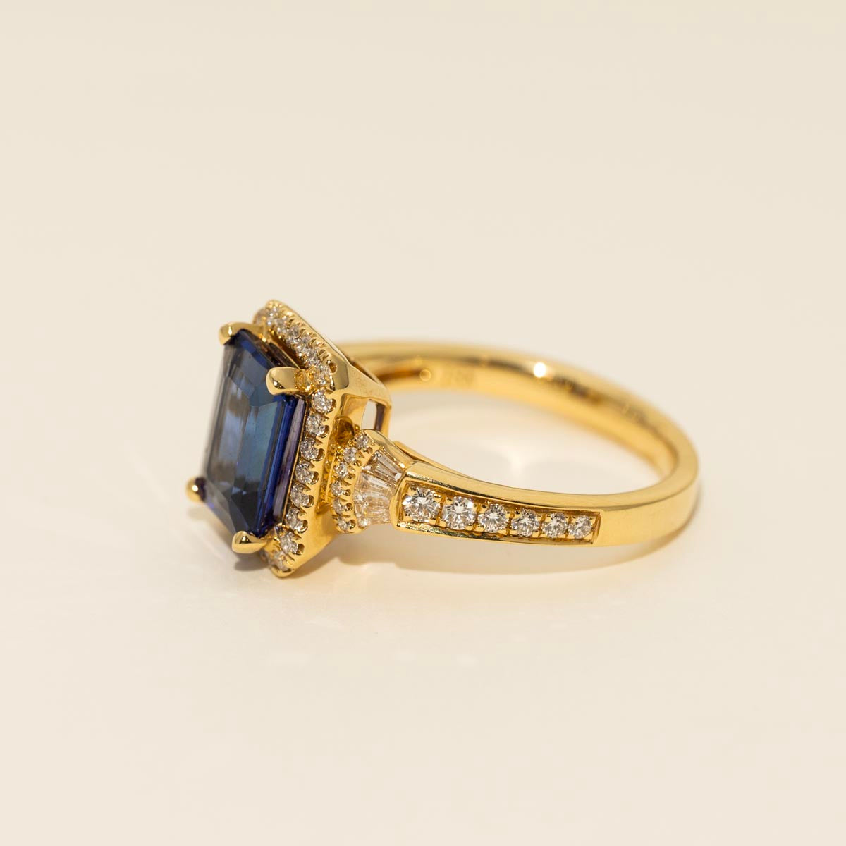 Emerald Cut Tanzanite Ring in 18kt Yellow Gold with Diamonds