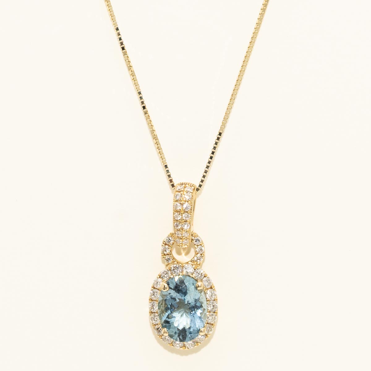 Oval Aquamarine Halo Necklace in 14kt Yellow Gold with Diamonds