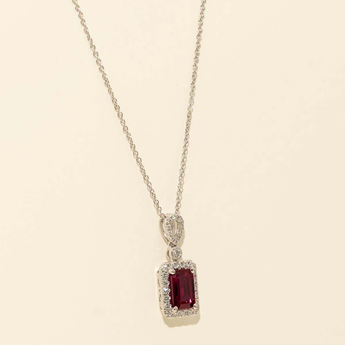 Emerald Cut Ruby Halo Necklace in 18kt White Gold with Diamonds