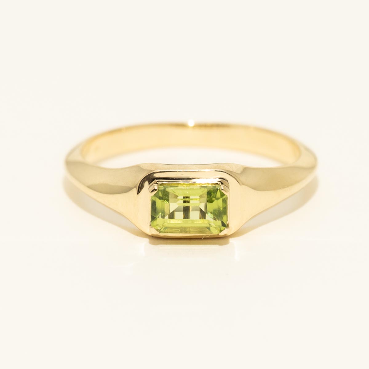 Emerald Cut Peridot Ring in 10kt Yellow Gold