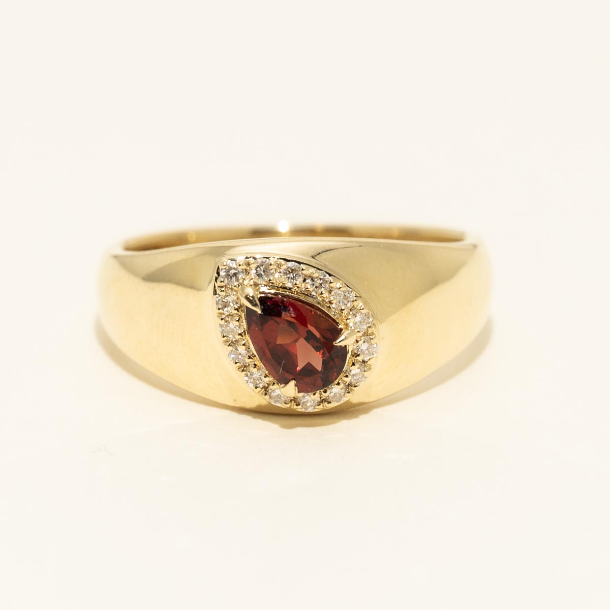 Pear Shape Garnet Halo Ring in 10kt Yellow Gold with Diamonds