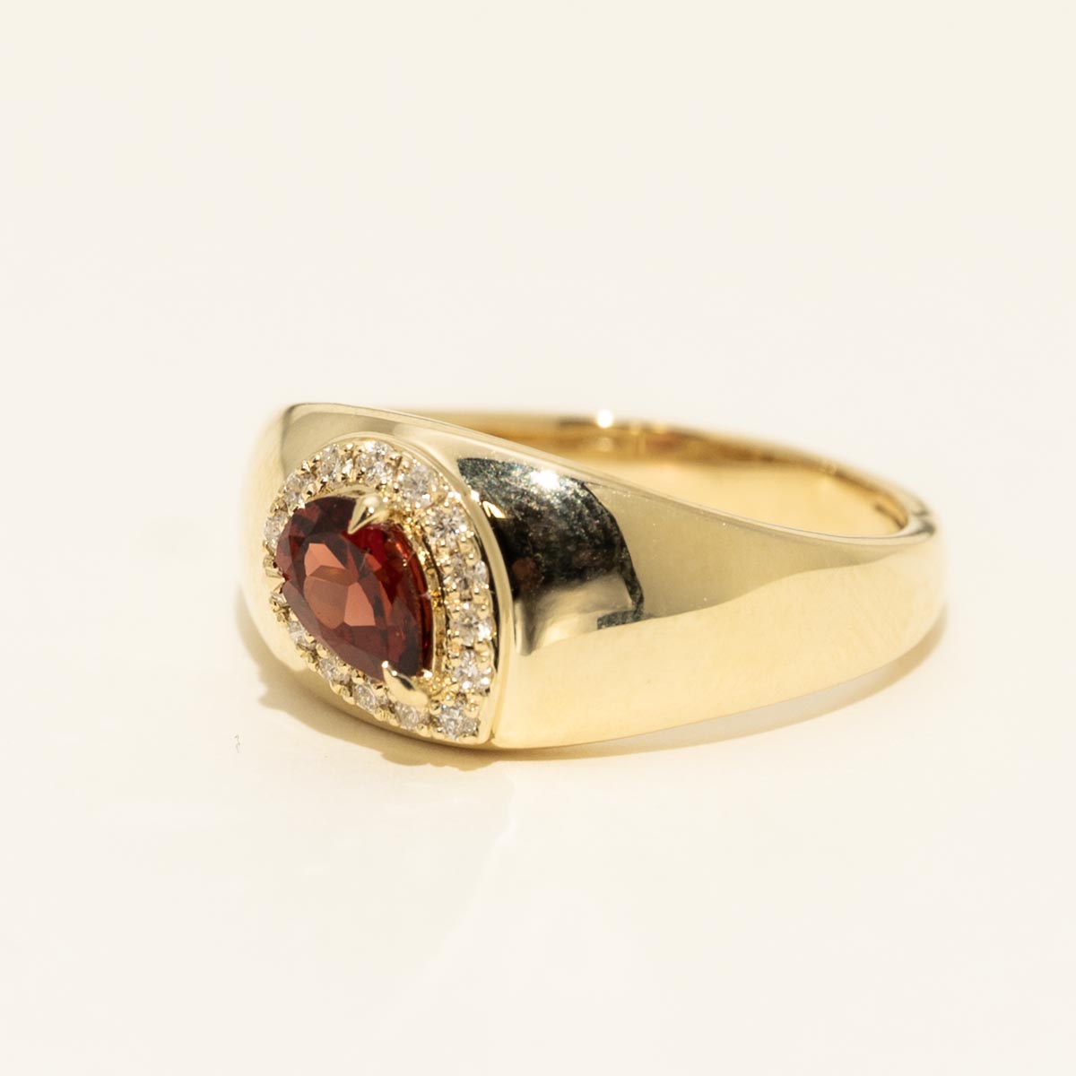 Pear Shape Garnet Halo Ring in 10kt Yellow Gold with Diamonds