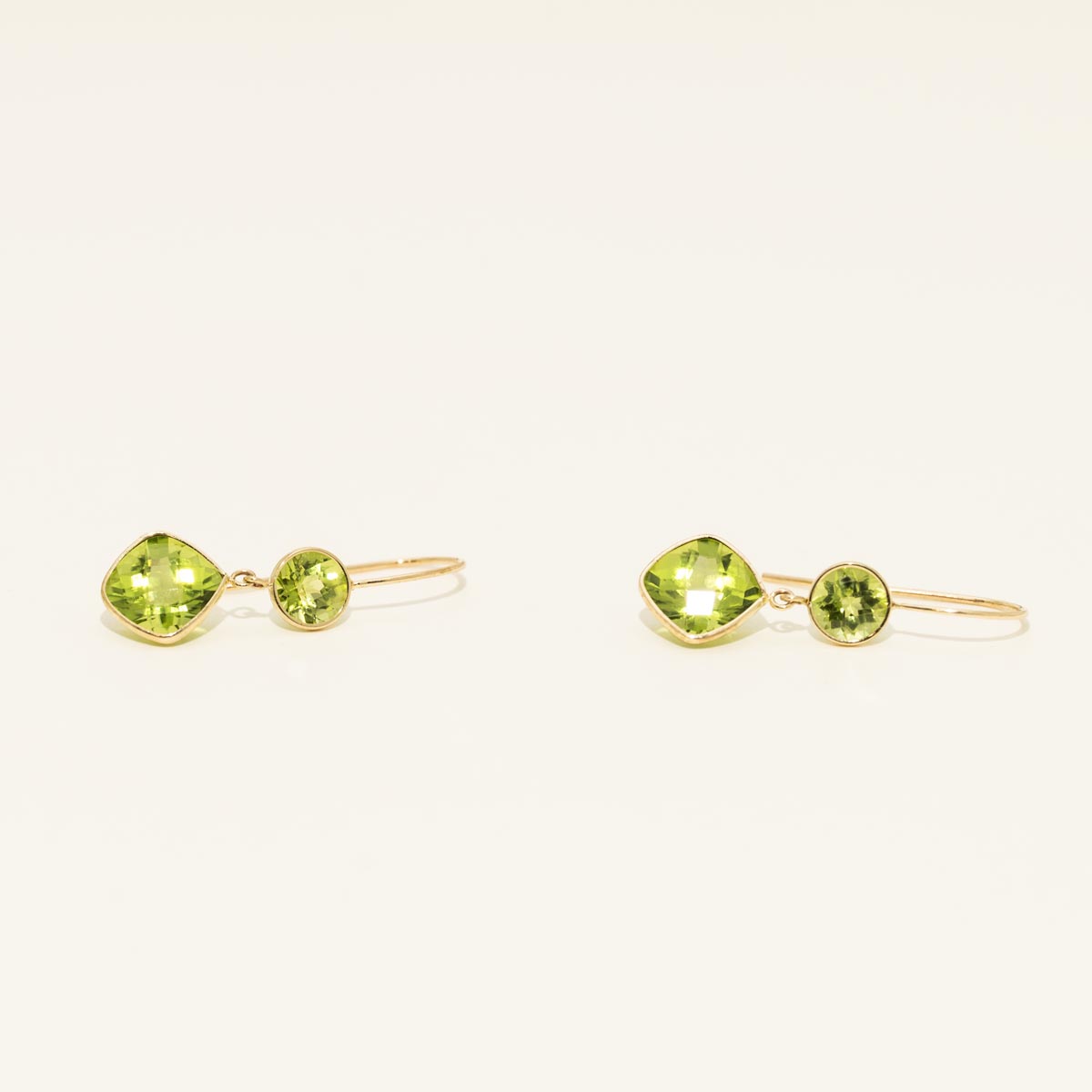 Cushion and Round Peridot Drop Earrings in 10kt Yellow Gold