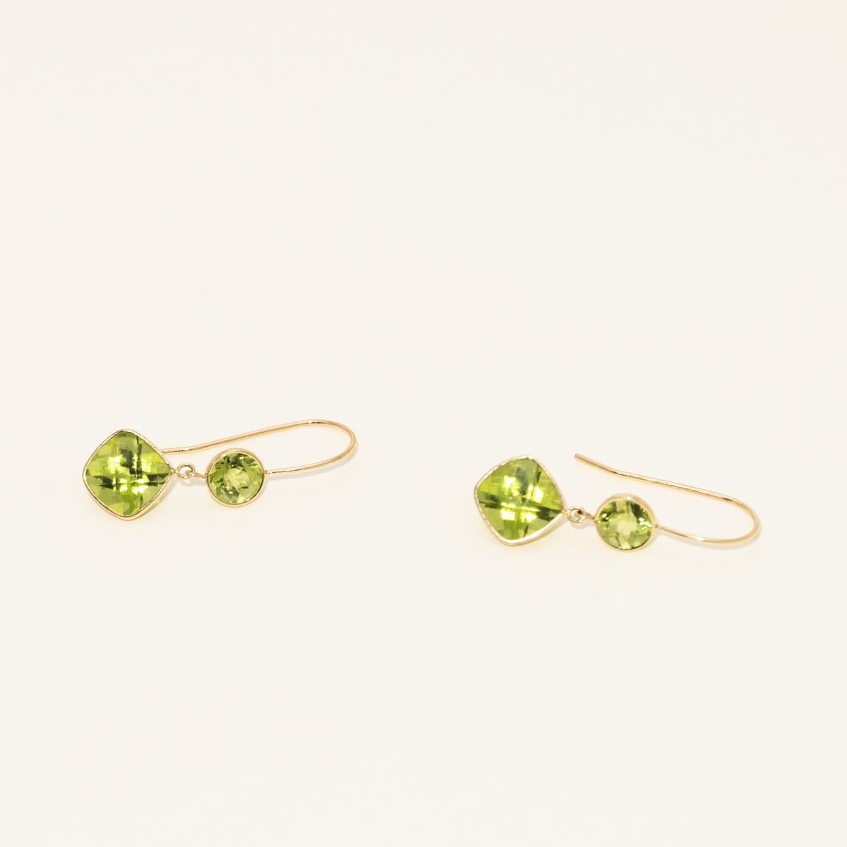 Cushion and Round Peridot Drop Earrings in 10kt Yellow Gold