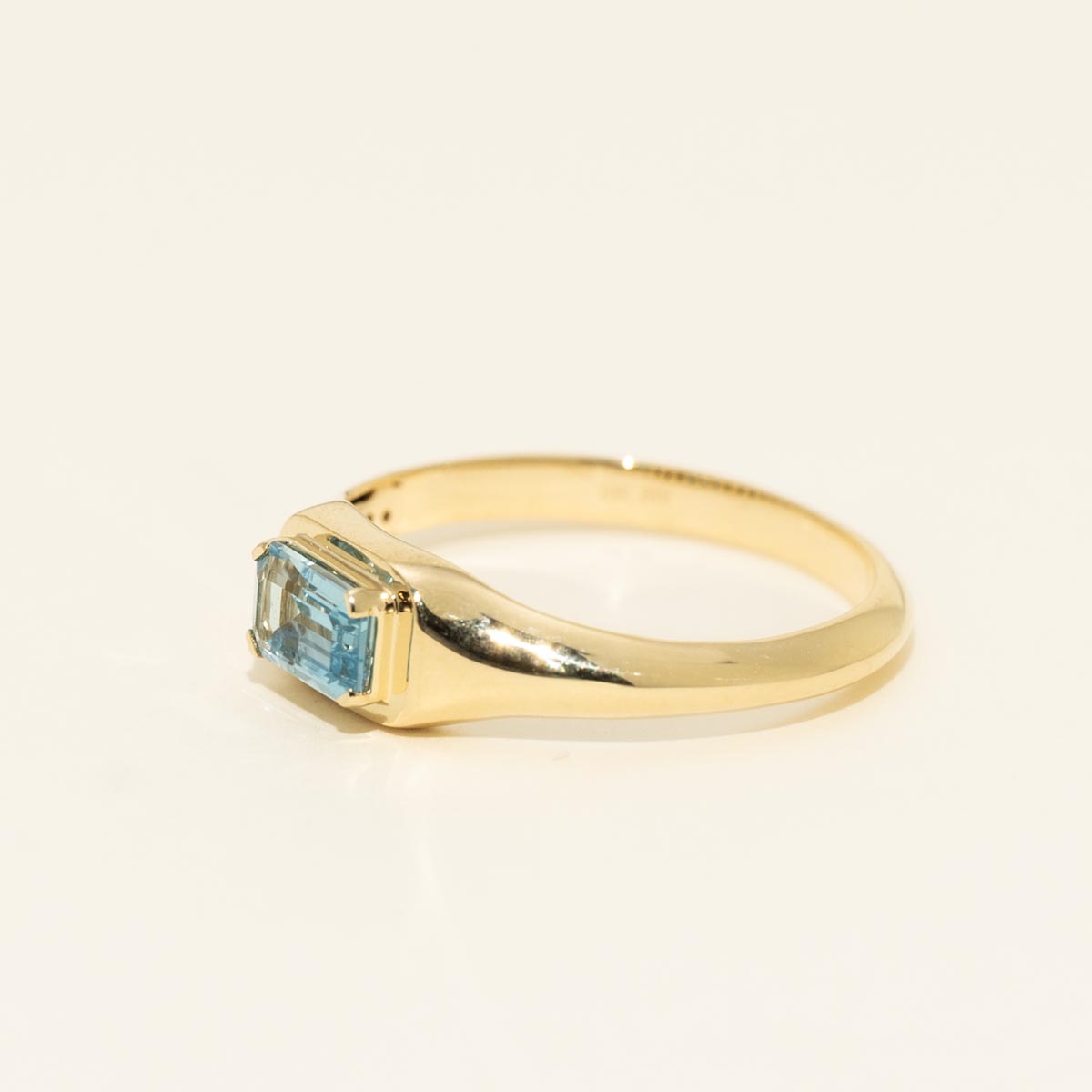 Emerald Cut Blue Topaz Ring in 10kt Yellow Gold