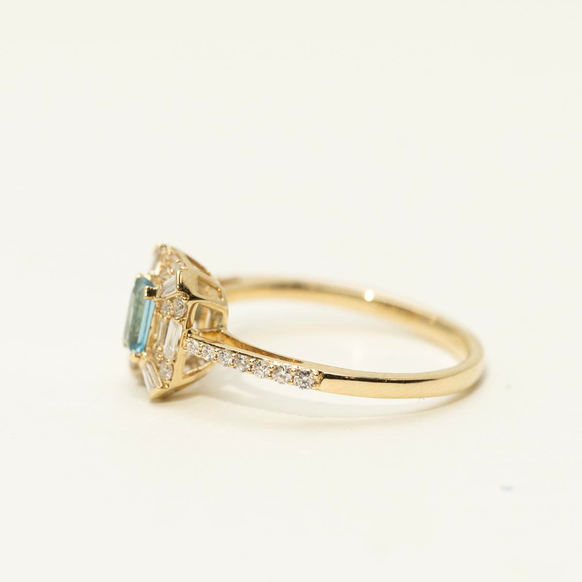 Emerald Cut Blue Topaz Halo Ring in 10kt Yellow Gold with Diamonds