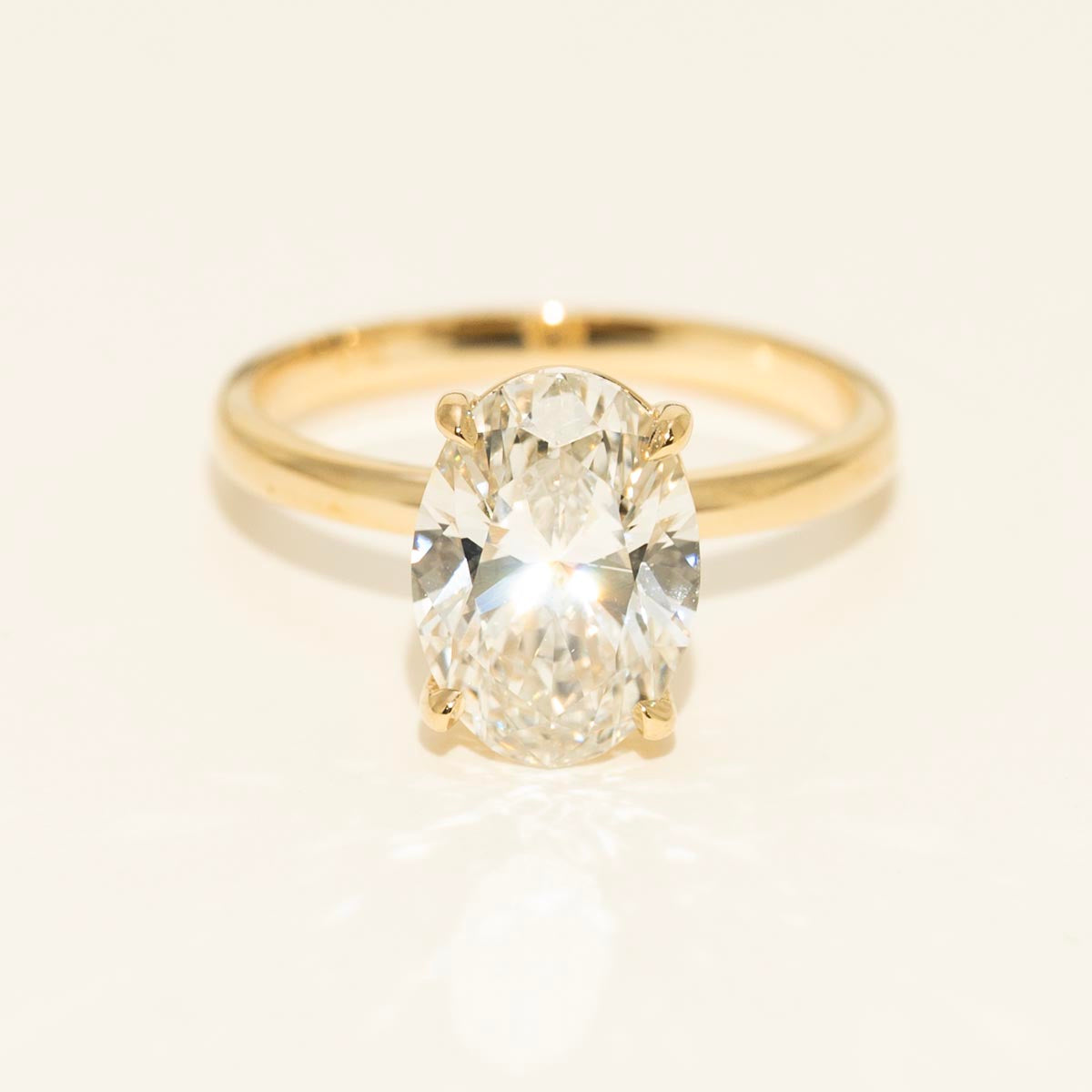 Lab Grown Oval Diamond Solitaire Engagement Ring in 14kt Yellow Gold (3ct)
